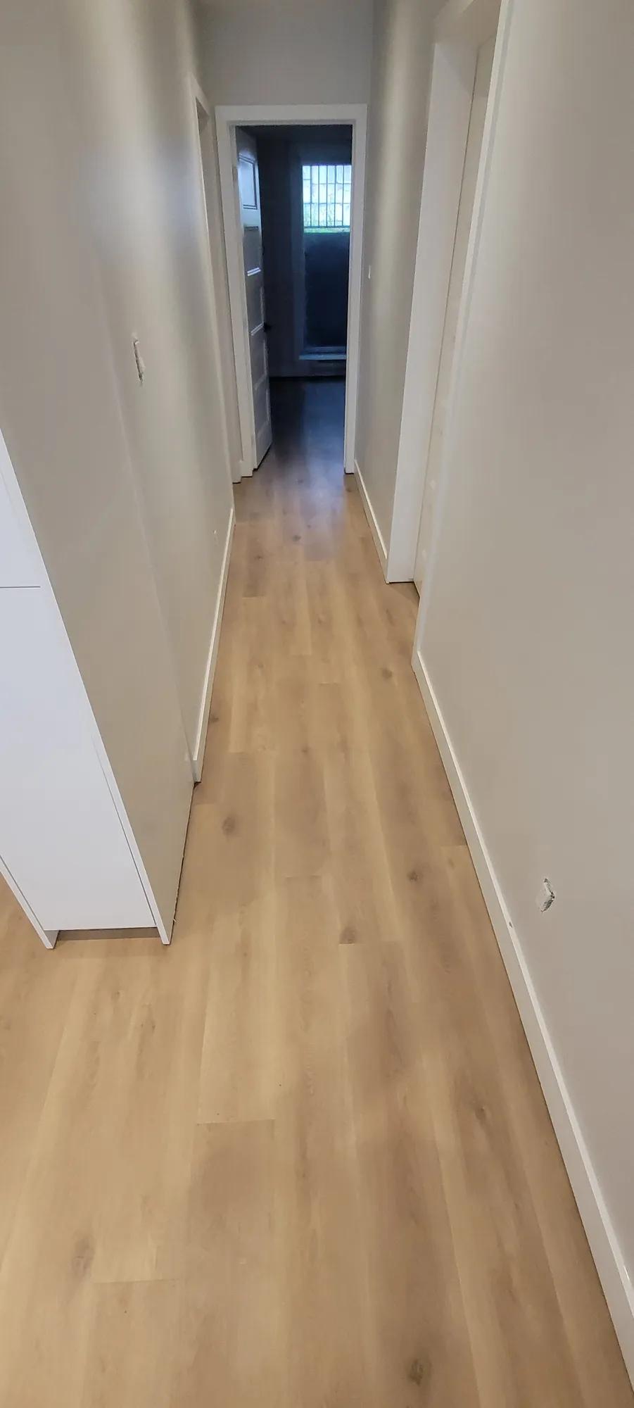 Vinyl plank flooring in a hallway
